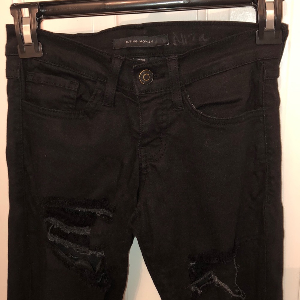 Black ripped skinny jeans